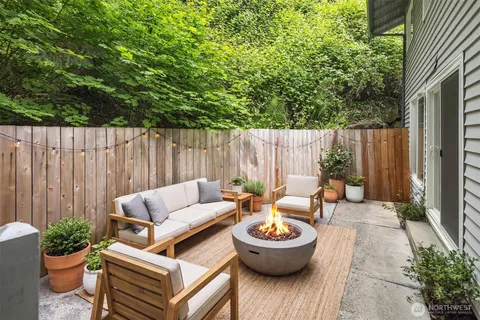 a outdoor living room with patio and furniture