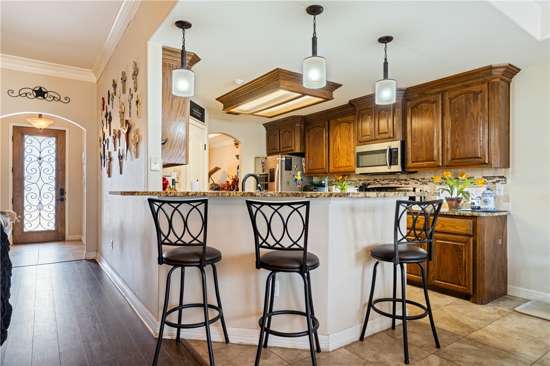 2602 Retta Drive Corpus Christi, TX 78418 - Photo 12 of 32 a view of a dining room with furniture