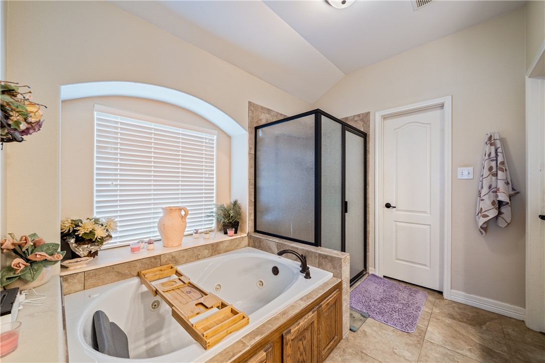 2602 Retta Drive Corpus Christi, TX 78418 - Photo 21 of 32 a bathroom with a tub sink and mirror