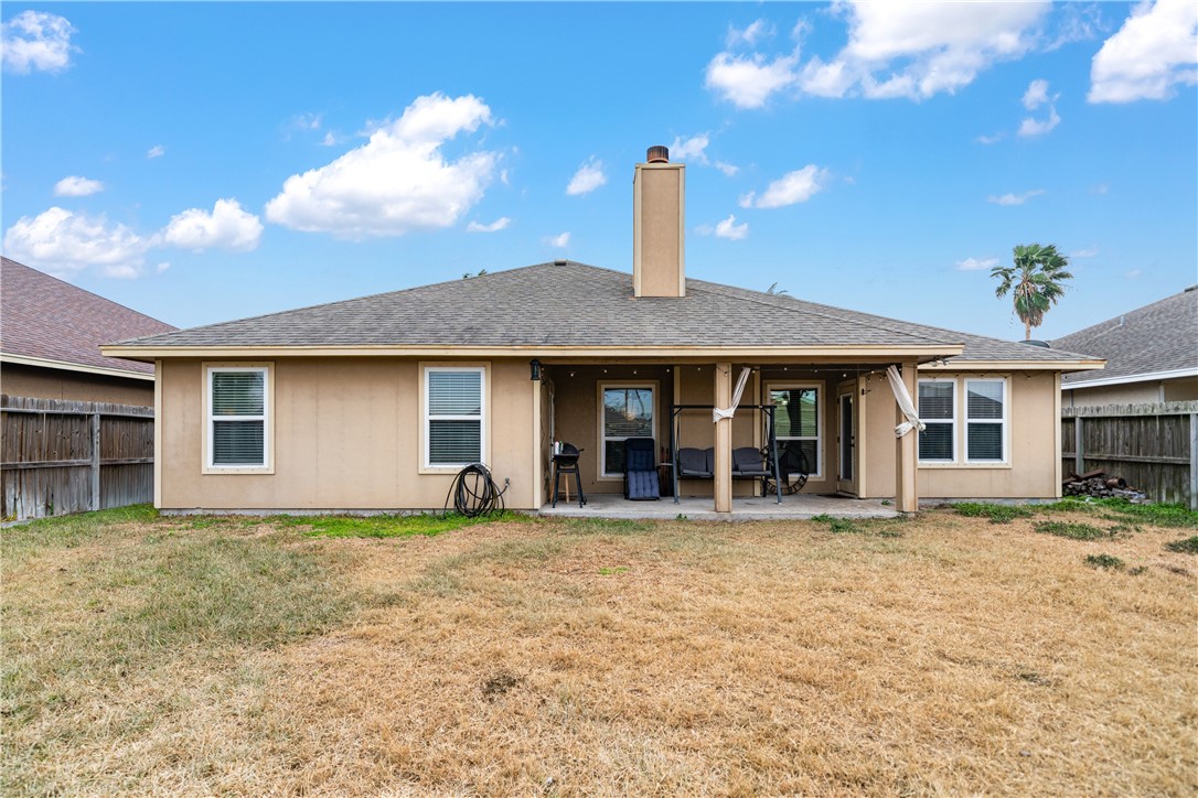 2602 Retta Drive Corpus Christi, TX 78418 - Photo 29 of 32 a front view of a house with yard and seating space