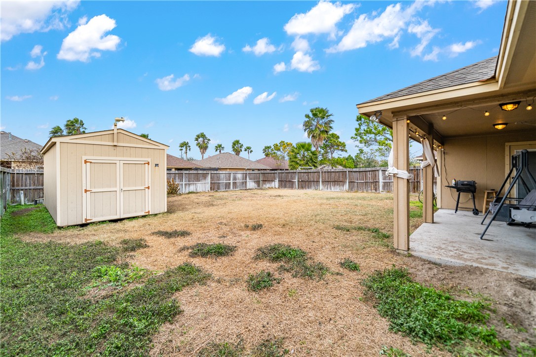 2602 Retta Drive Corpus Christi, TX 78418 - Photo 30 of 32 a view of a house with a yard