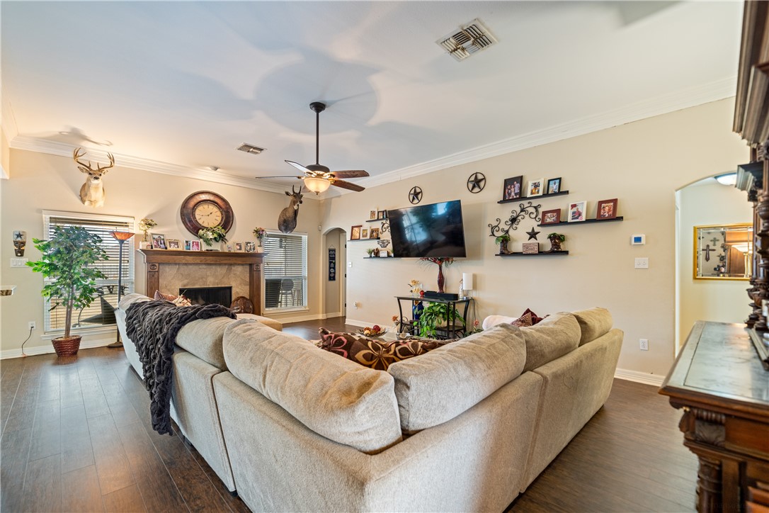 2602 Retta Drive Corpus Christi, TX 78418 - Photo 6 of 32 a living room with furniture and a fireplace