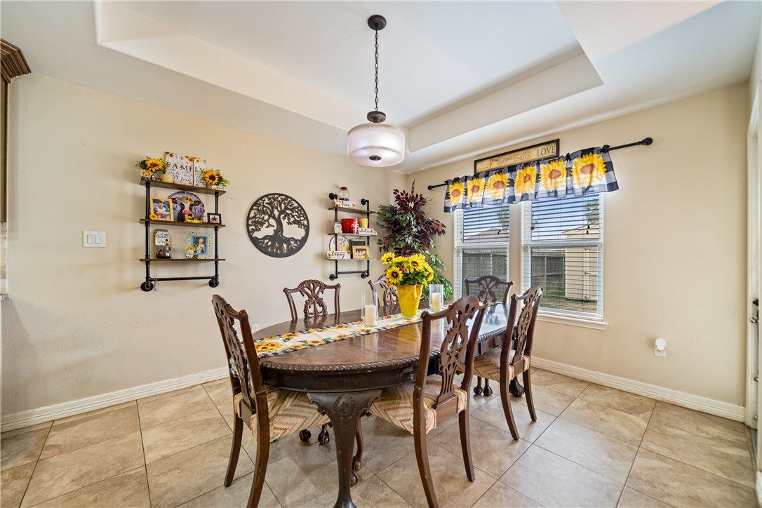 2602 Retta Drive Corpus Christi, TX 78418 - Photo 10 of 32 a view of a dining room with furniture window and outdoor kitchen