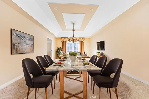 a view of an entryway with wooden floor and a potted plant