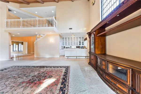 a bathroom with a double vanity sink mirror and toilet