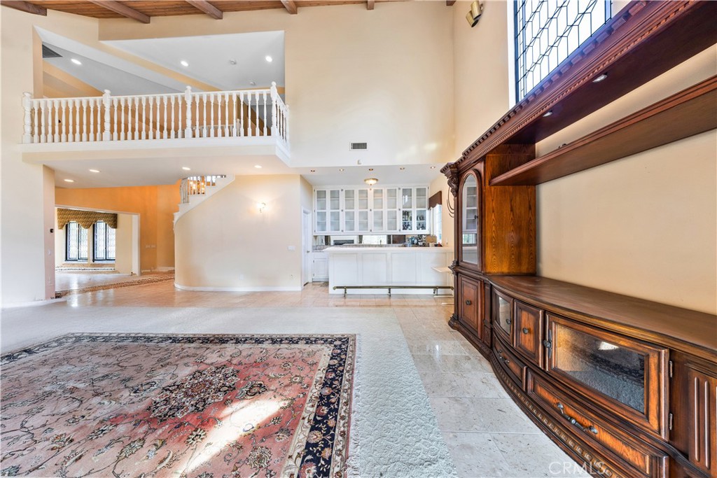 2 Linda Rae Way Arcadia, CA 91006 - Photo 22 of 63 a view of a hallway with wooden floor and staircase