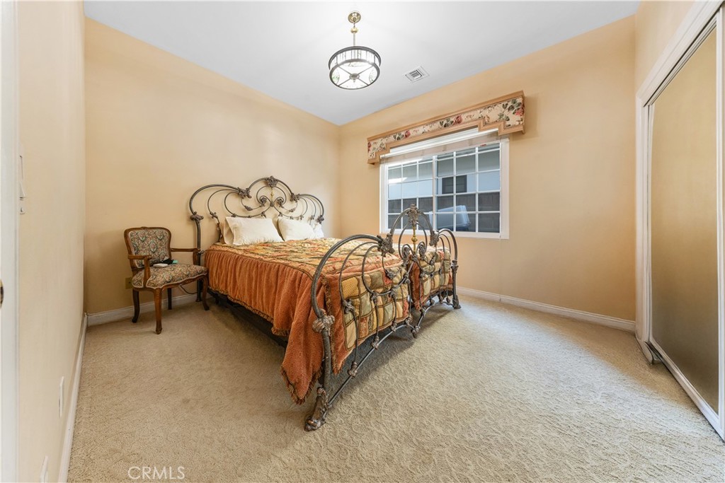 2 Linda Rae Way Arcadia, CA 91006 - Photo 24 of 63 a bedroom with a bed chair and a window