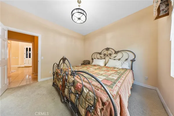 a view of a dining room with furniture and window