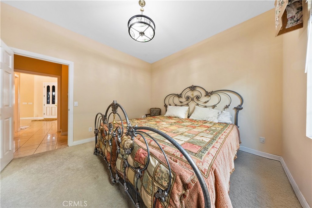 2 Linda Rae Way Arcadia, CA 91006 - Photo 25 of 63 a bedroom with a bed and a window