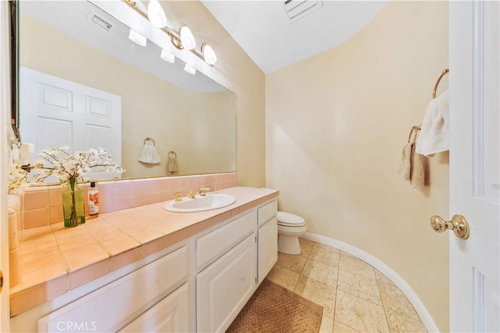 2 Linda Rae Way Arcadia, CA 91006 - Photo 27 of 63 a bathroom with a double vanity sink mirror and toilet