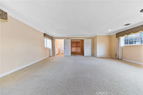 a bathroom with a double vanity sink and mirror
