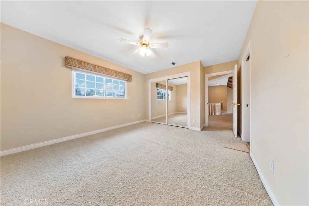 2 Linda Rae Way Arcadia, CA 91006 - Photo 42 of 63 an empty room with chandelier fan and windows