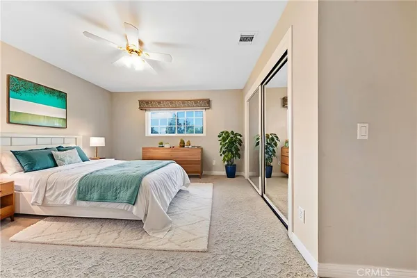 a view of a backyard with sitting area