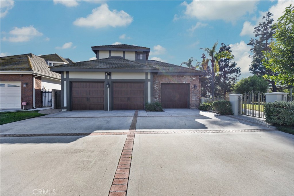 2 Linda Rae Way Arcadia, CA 91006 - Photo 5 of 63 a front view of a house with a yard and garage