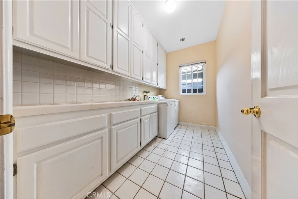 2 Linda Rae Way Arcadia, CA 91006 - Photo 51 of 63 a kitchen with a sink and cabinets