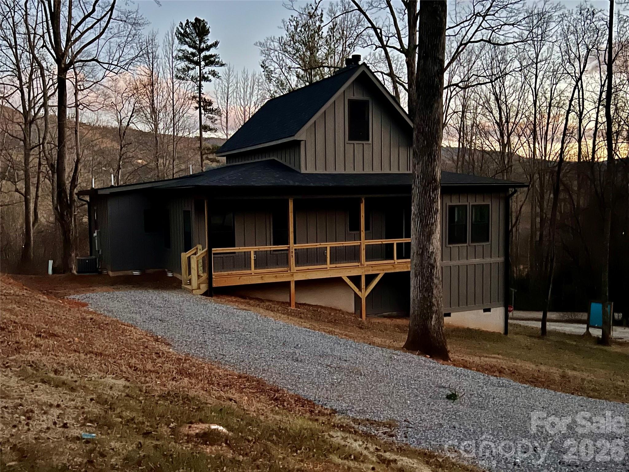 199 Clinchfield Gap Road Marion, NC 28752 - Photo 1 of 29 a view of a house with a yard and large tree