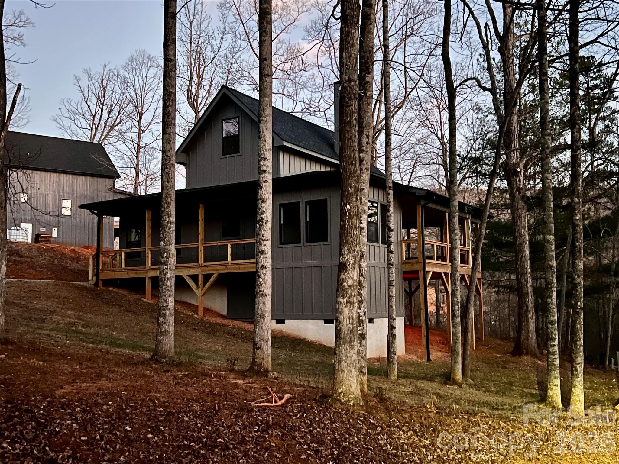 199 Clinchfield Gap Road Marion, NC 28752 - Photo 2 of 29 a view of a house with a yard