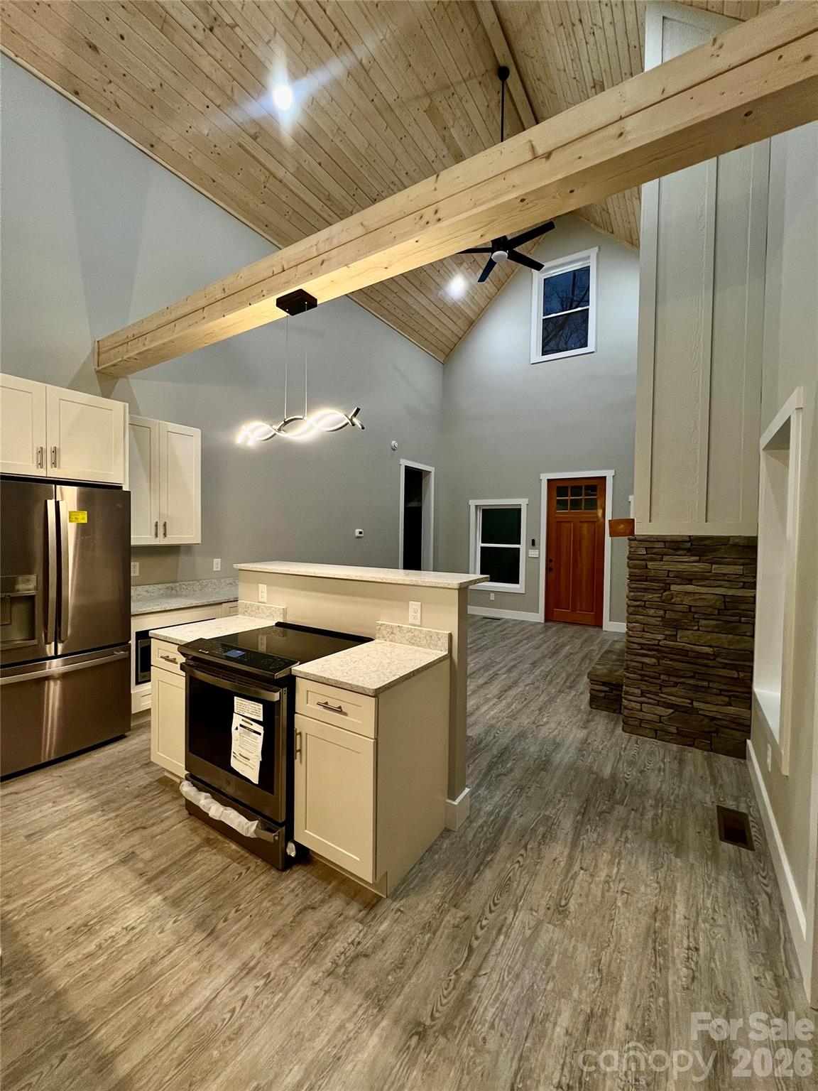199 Clinchfield Gap Road Marion, NC 28752 - Photo 8 of 29 a kitchen with stainless steel appliances granite countertop a stove and a refrigerator