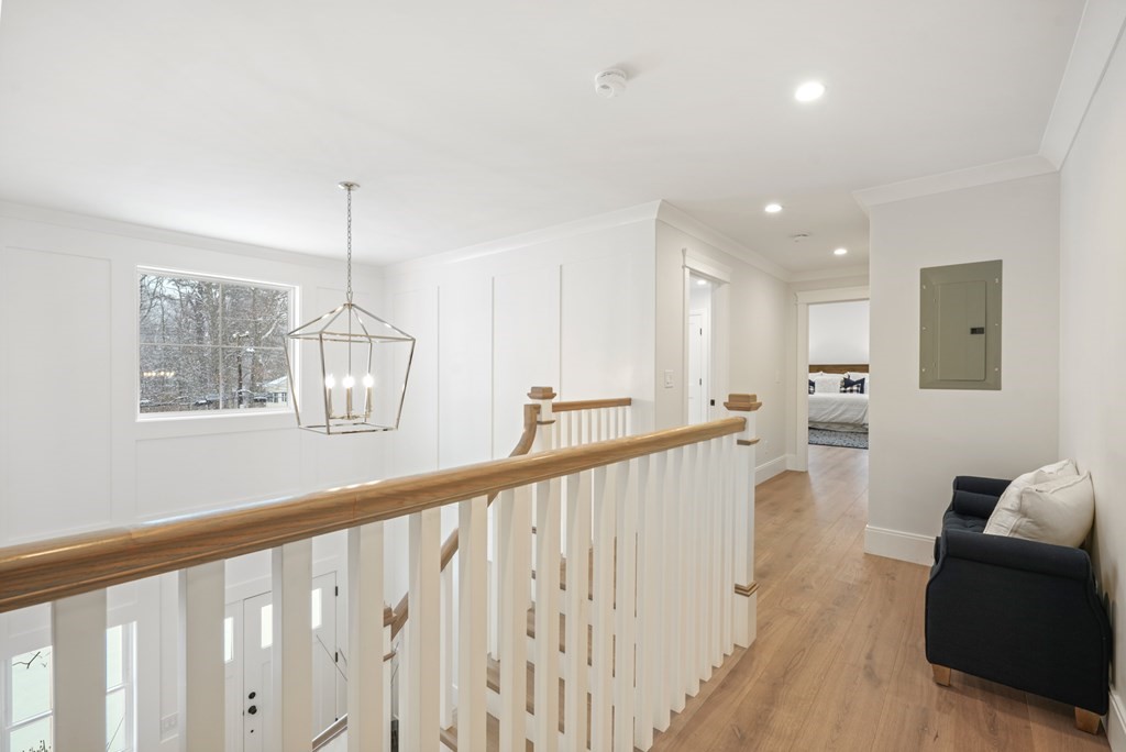 15 Peterson Road Natick, MA 01760 - Photo 16 of 27 a view of a hallway with furniture and windows
