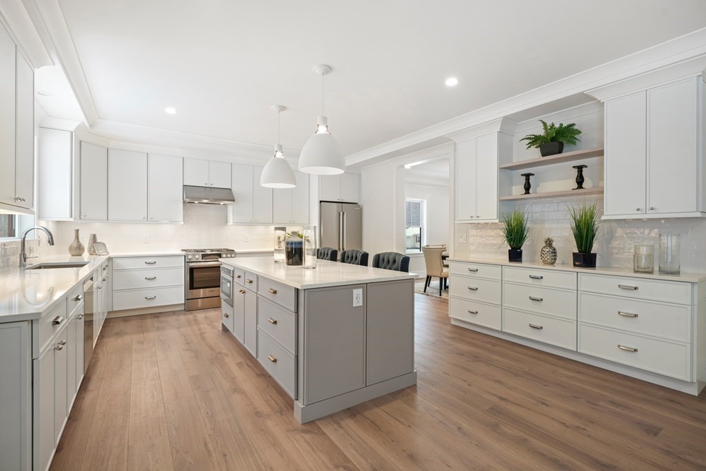 15 Peterson Road Natick, MA 01760 - Photo 7 of 27 a kitchen with cabinets oven and a sink