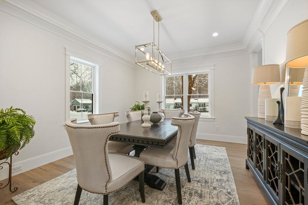 15 Peterson Road Natick, MA 01760 - Photo 8 of 27 a dining room with furniture potted plants