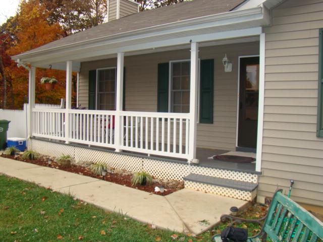 1334 Thomasson Mill Road Goodview, VA 24095 - Photo 1 of 7 a view of a house with a bench in a yard