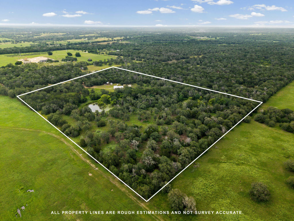 608 Whistleville Road Flatonia, TX 78941 - Photo 18 of 26 Notice the two ponds tucked away right inside your tree line.