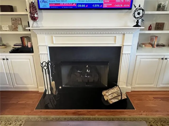 a view of front door with wooden floor