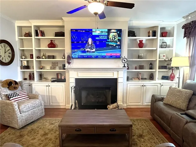 a kitchen with stainless steel appliances granite countertop a refrigerator a stove and a sink