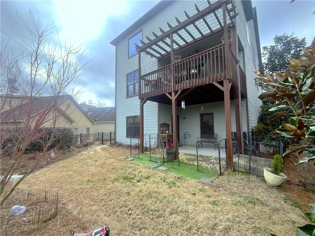 307 Cornerstone Trace Woodstock, GA 30188 - Photo 37 of 43 a view of a chair and table in backyard of the house