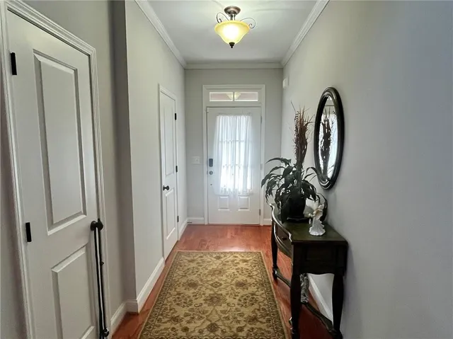 a kitchen with stainless steel appliances a refrigerator and a stove top oven