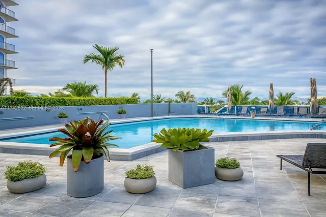 a view of front door with wooden floor