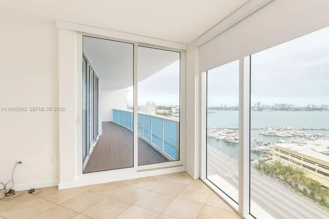 a view of a livingroom with wooden floor