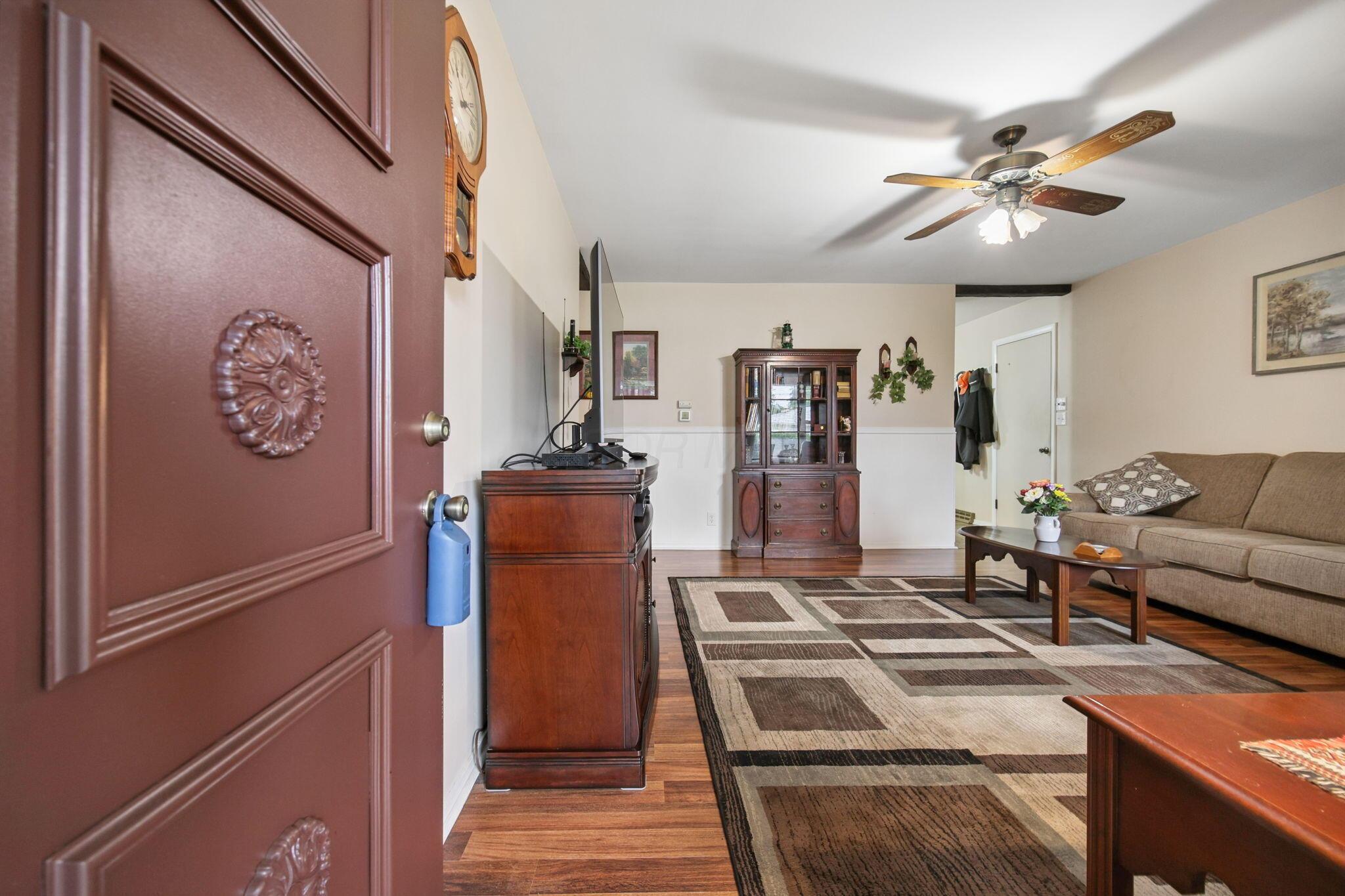 256 Walden Road Heath, OH 43056 - Photo 5 of 24 New wood/vinyl flooring throughout.