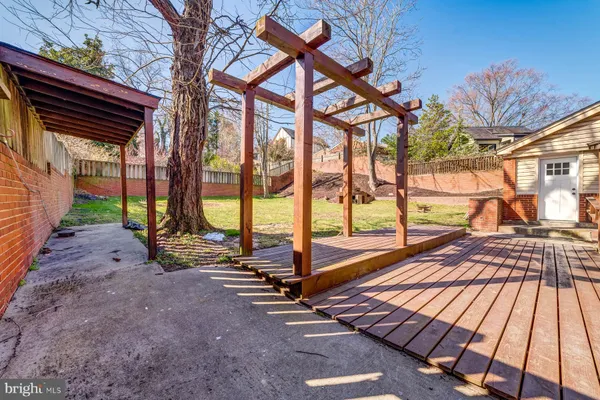 a view of a backyard with a patio