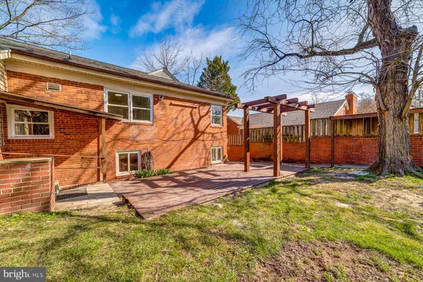 a backyard of a house with seating space