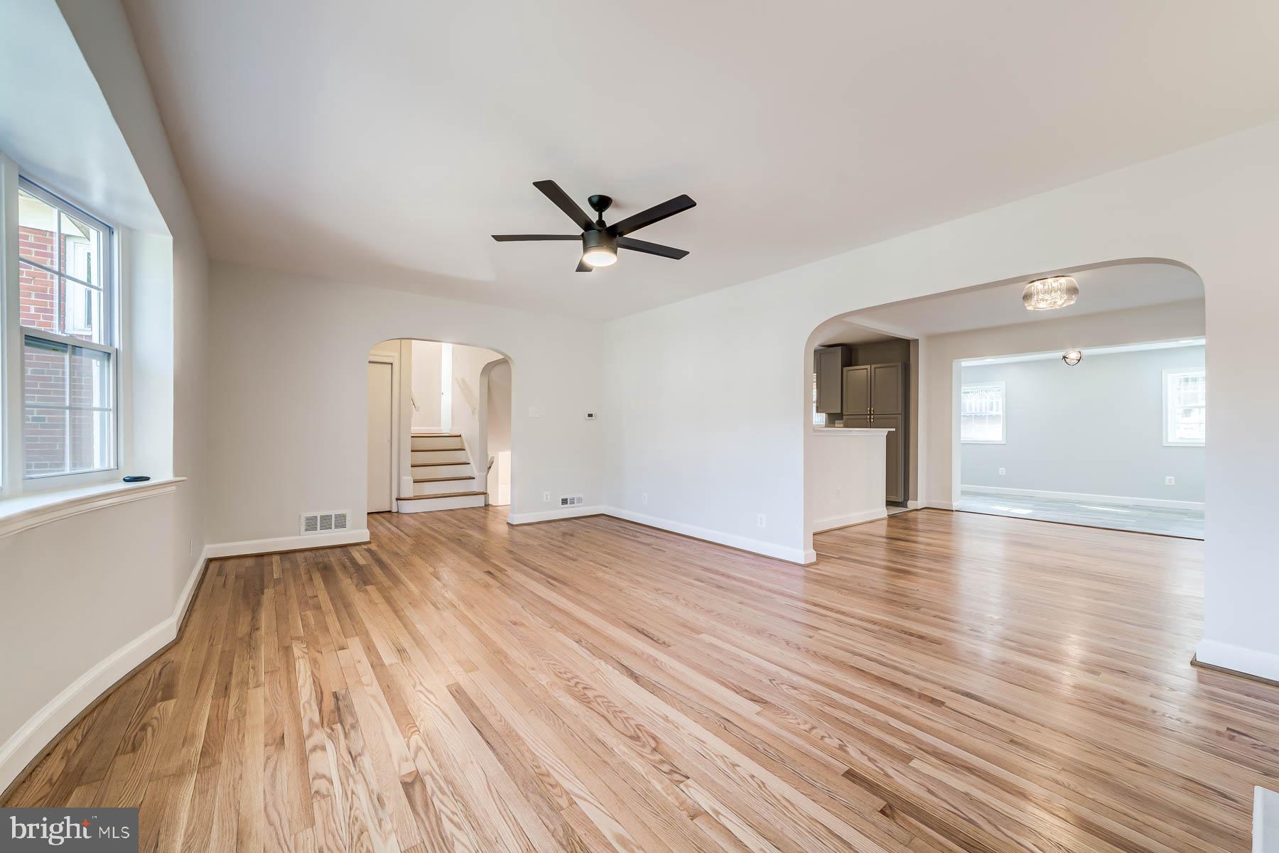 2608 Rittenhouse Street Northwest Washington, DC 20015 - Photo 5 of 45 wooden floor in an empty room with a window