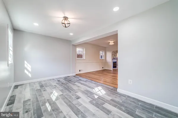a view of a livingroom with a hardwood floor