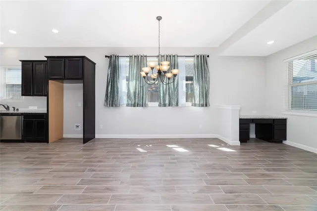 a view of a kitchen with a sink and dishwasher kitchen view
