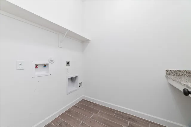 a bathroom with a bathtub a sink and a shower