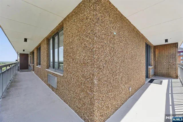 a view of hallway with stairs