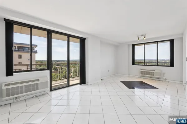 a view of an empty room and window