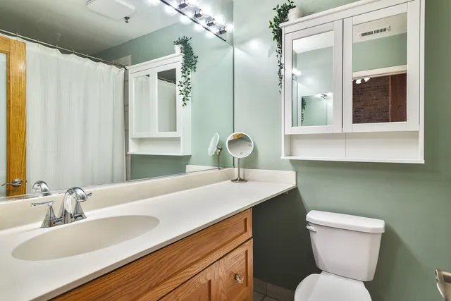 a bathroom with a sink and a toilet