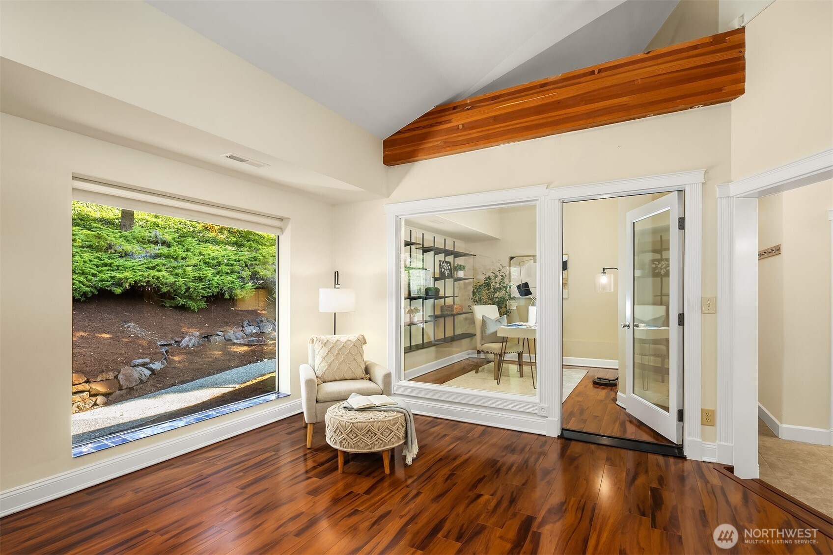23723 9th Place West Bothell, WA 98021 - Photo 15 of 28 a living room with wooden floor and a table