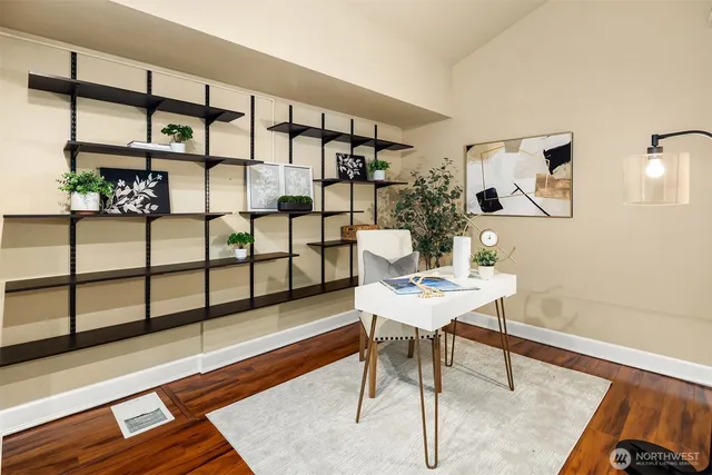 a workspace with furniture and window