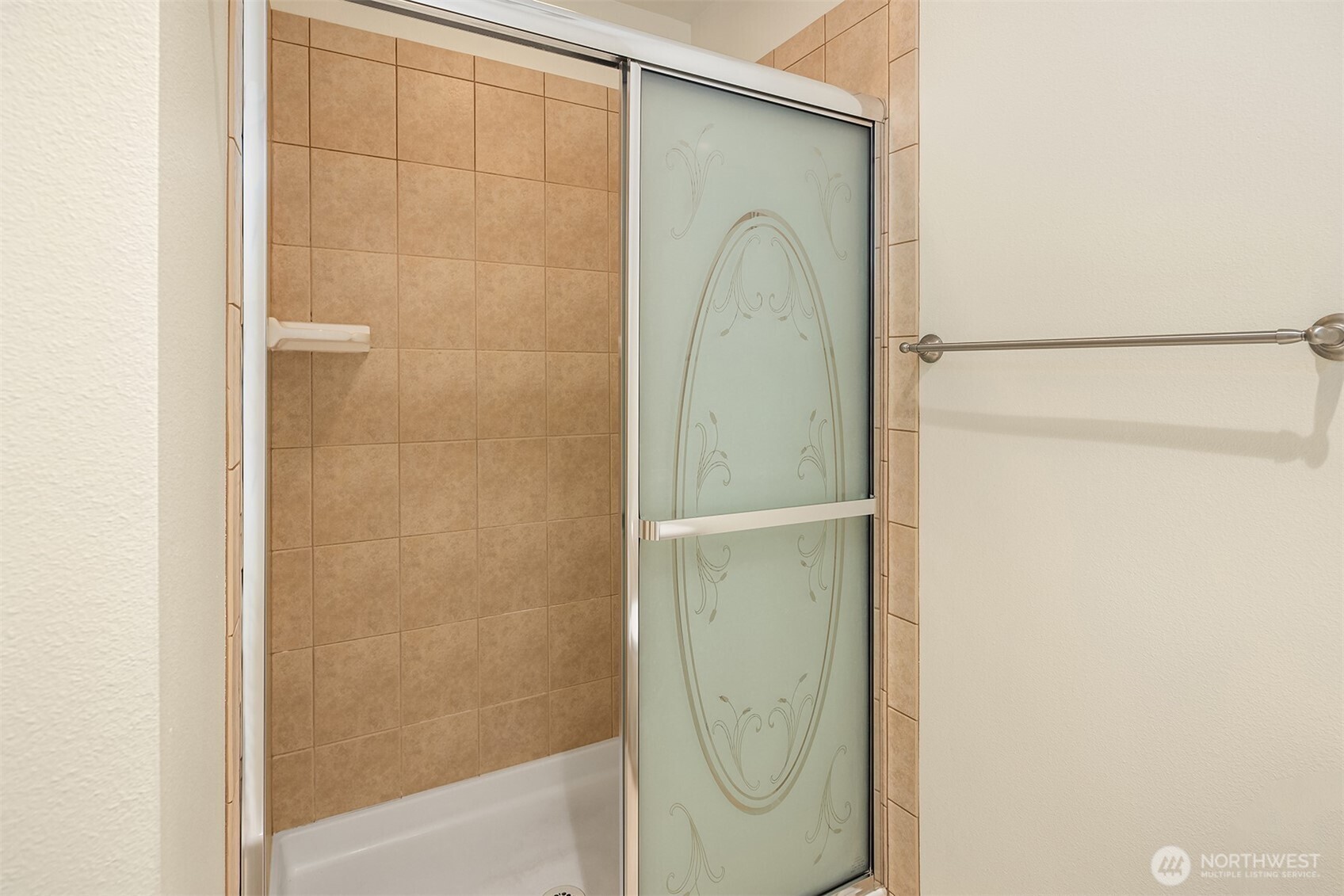 23723 9th Place West Bothell, WA 98021 - Photo 25 of 28 a bathroom with a glass shower door