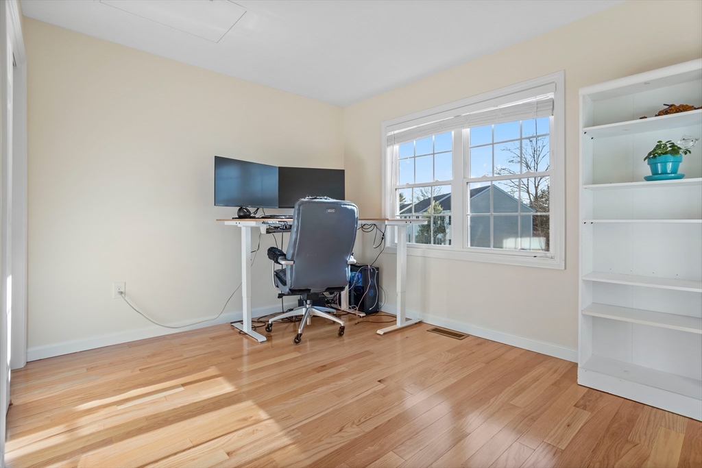 41 Boston Road, Unit 433 Billerica, MA 01862 - Photo 16 of 23 a view of a workspace with furniture and a window