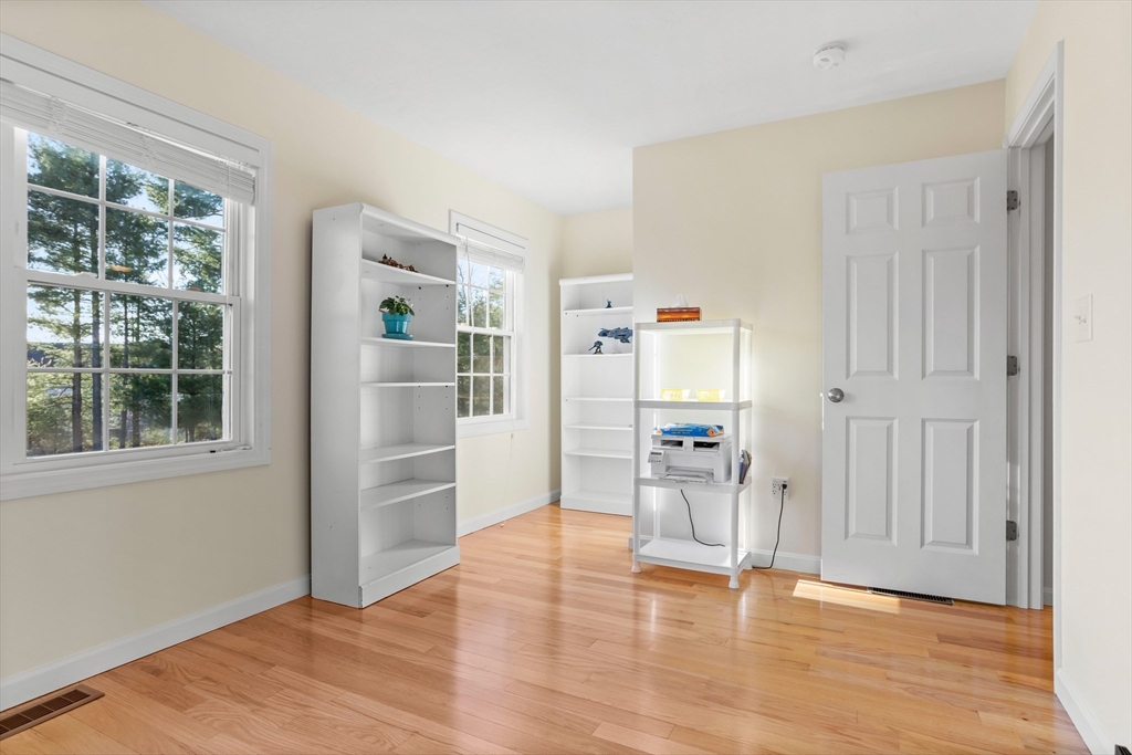 41 Boston Road, Unit 433 Billerica, MA 01862 - Photo 17 of 23 a view of empty room with wooden floor and window