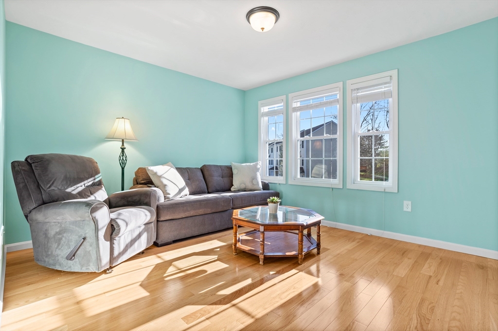 41 Boston Road, Unit 433 Billerica, MA 01862 - Photo 8 of 23 a living room with furniture and a window