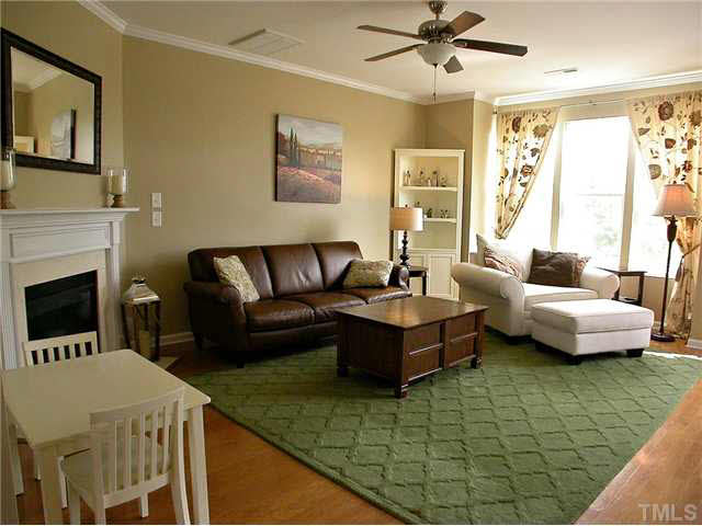 9103 Falkwood Road Raleigh, NC 27617 - Photo 8 of 25 This Home Sparkles -- Oversized Living Room has 9' Ceiling with Crown Molding and Ceiling Fan